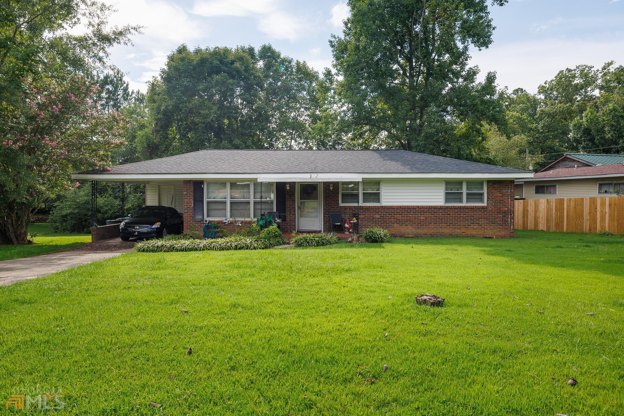 102 Norcross Way Road Southwest Rome, GA 30165 - Photo 1 of 1 a view of a house with a yard patio and a patio