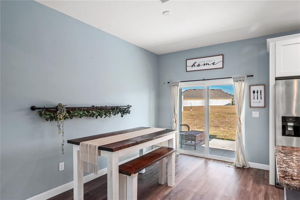 2839 Northeast 43rd Road Ocala, FL 34470 - Photo 20 of 50 a room with furniture and wooden floor