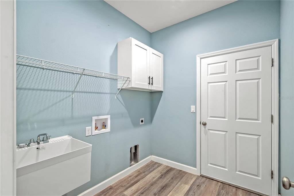 2839 Northeast 43rd Road Ocala, FL 34470 - Photo 34 of 50 a bathroom with a sink and vanity