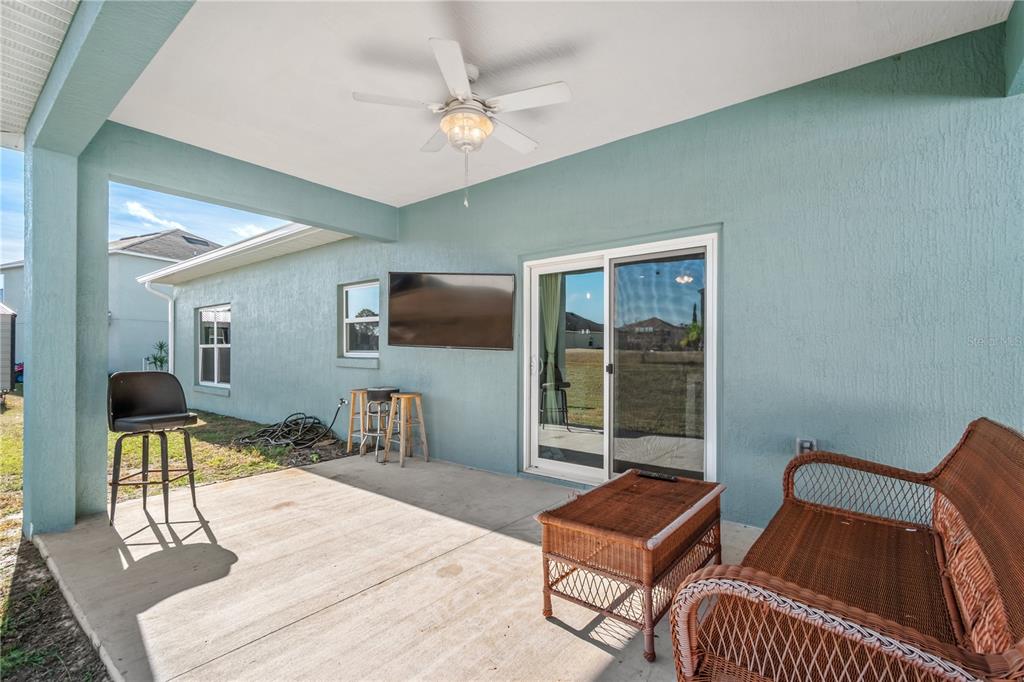2839 Northeast 43rd Road Ocala, FL 34470 - Photo 35 of 50 a room with furniture and a flat screen tv