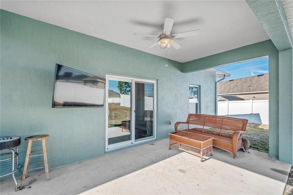 2839 Northeast 43rd Road Ocala, FL 34470 - Photo 36 of 50 a living room with furniture and a window