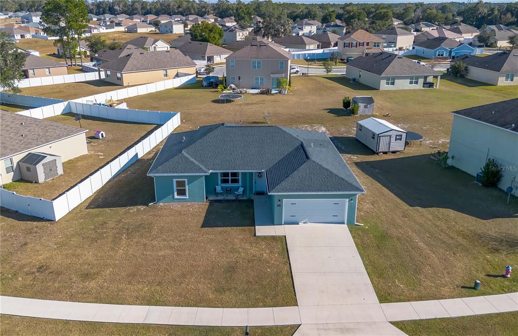 2839 Northeast 43rd Road Ocala, FL 34470 - Photo 39 of 50 a view of a house with a swimming pool
