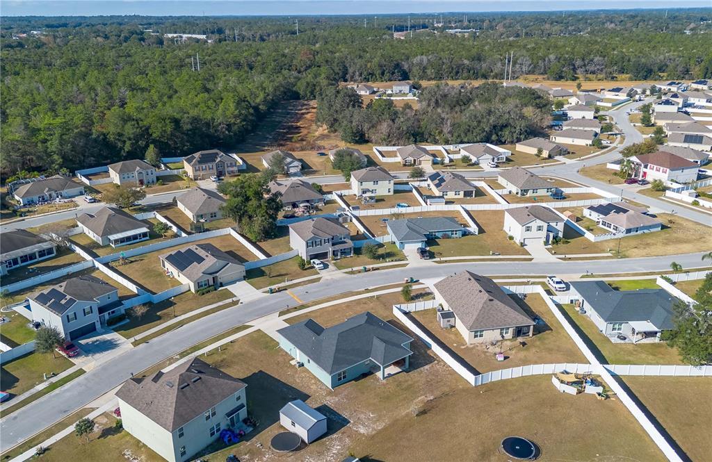 2839 Northeast 43rd Road Ocala, FL 34470 - Photo 44 of 50 an aerial view of residential houses with outdoor space