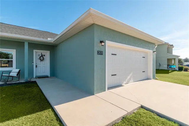 a backyard of a house with seating space