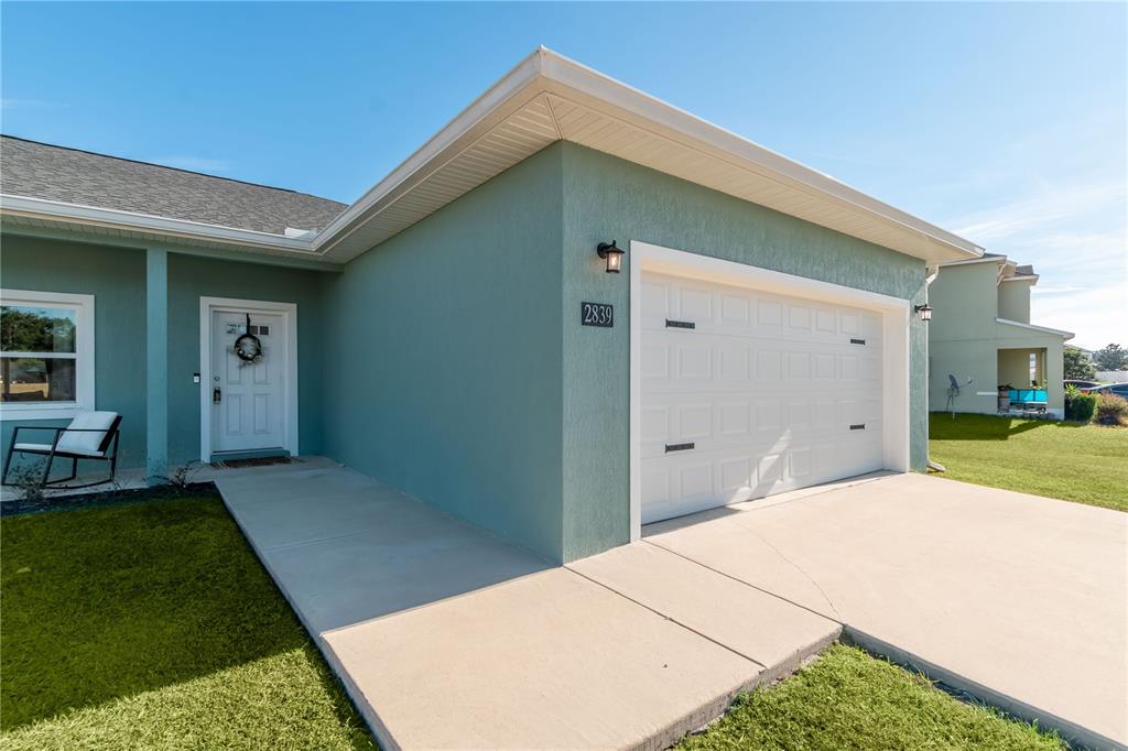 2839 Northeast 43rd Road Ocala, FL 34470 - Photo 7 of 50 a backyard of a house with seating space