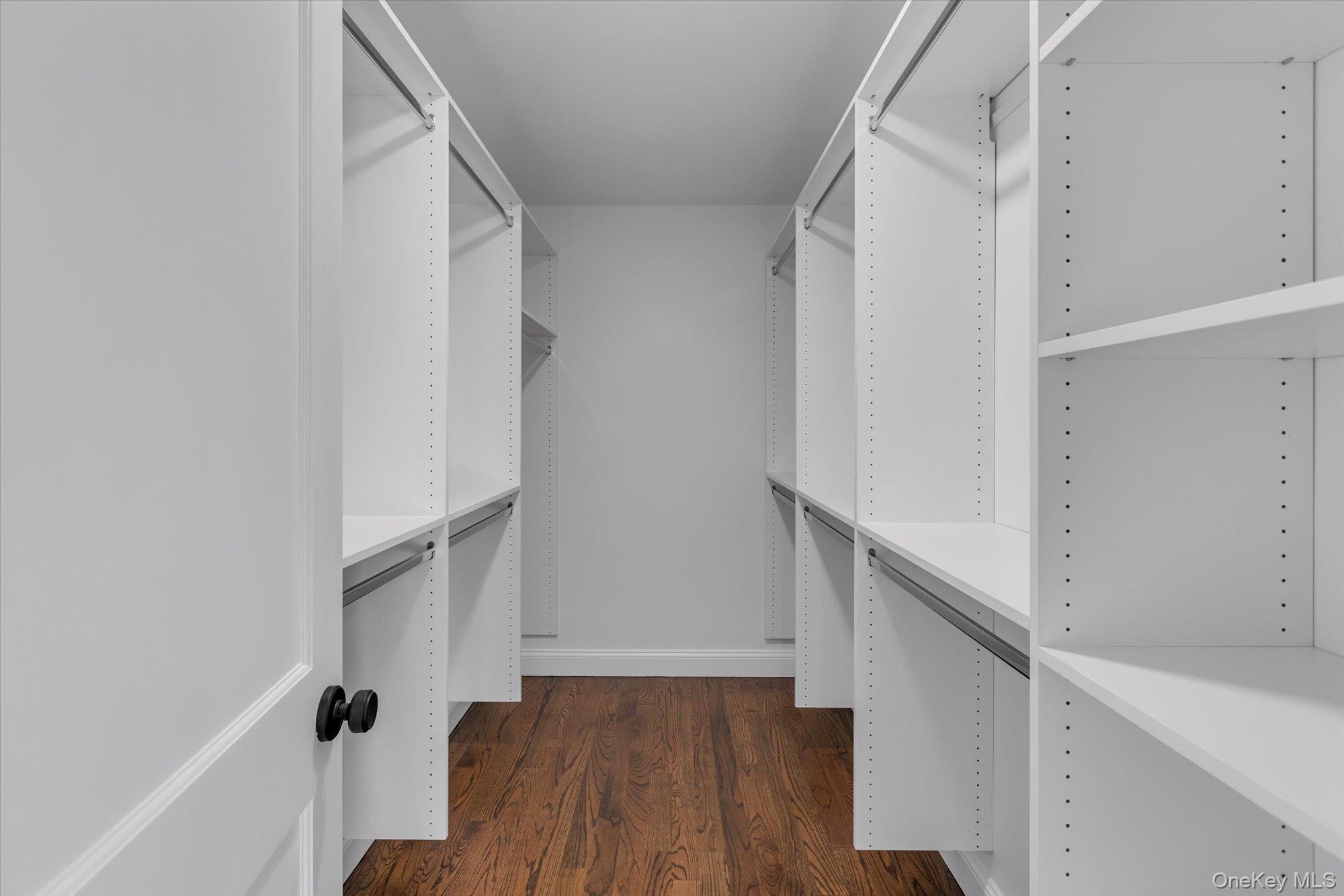 44 North Woodhull Road Huntington, NY 11743 - Photo 24 of 26 Spacious closet with dark wood finished floors