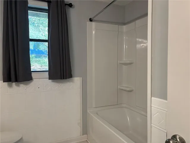 a bathroom with a bathtub