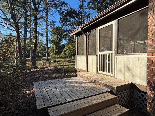 a view of an empty room with a large window