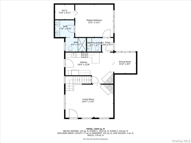 a picture of a bench in front of a wall