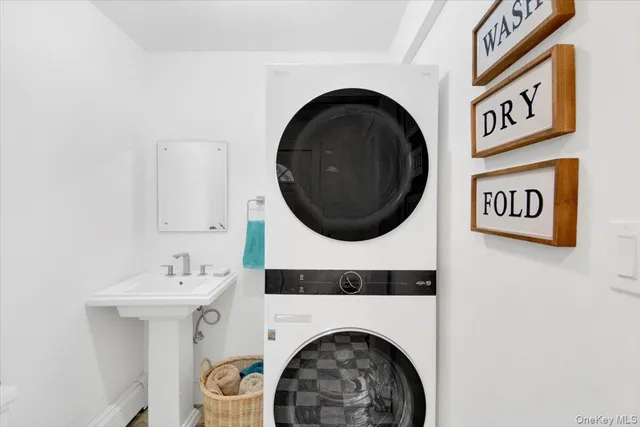 a utility room with dryer and washer