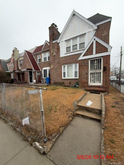 177-26 Ursina Road Queens, NY 11434 - Photo 2 of 3 a front view of a house with a yard