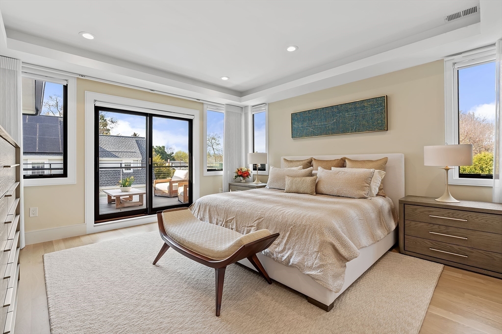 9 Whittlesey Road Newton, MA 02459 - Photo 12 of 33 a spacious bedroom with a bed and large window