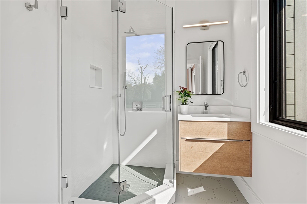 9 Whittlesey Road Newton, MA 02459 - Photo 21 of 33 a bathroom with a shower and a sink