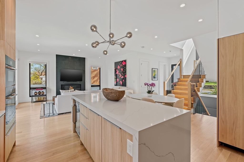9 Whittlesey Road Newton, MA 02459 - Photo 4 of 33 a living room with furniture and a flat screen tv
