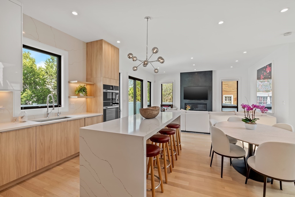 9 Whittlesey Road Newton, MA 02459 - Photo 5 of 33 a view of a dining room with furniture window and wooden floor