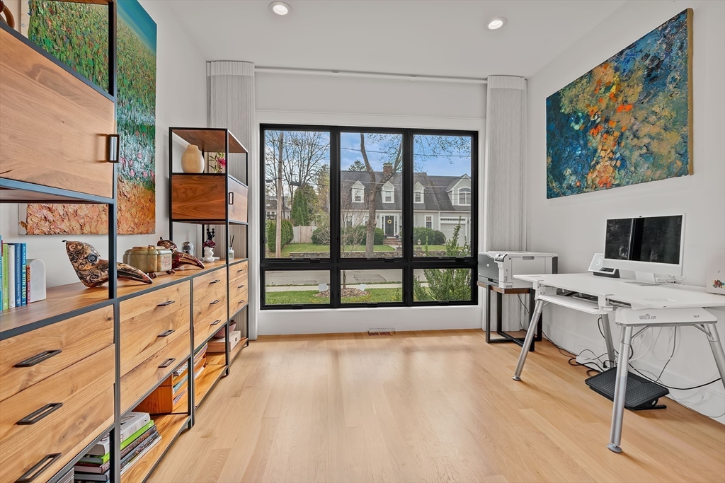 9 Whittlesey Road Newton, MA 02459 - Photo 9 of 33 a spacious bedroom with a large window and a bed