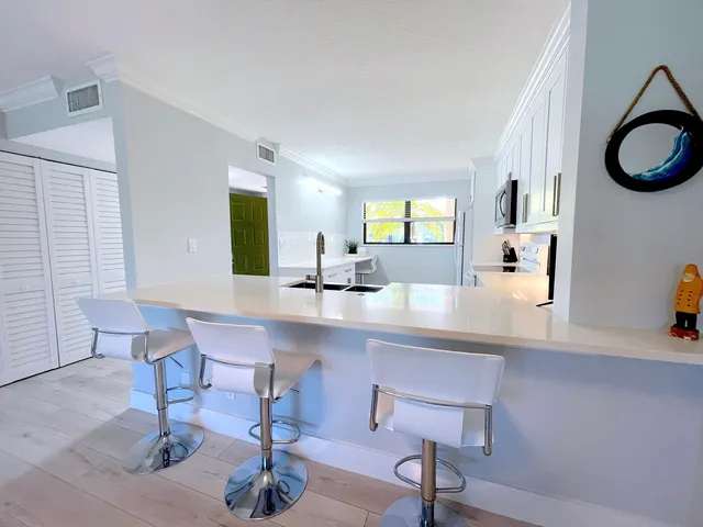 $335,000 | 13403 Touchstone Place, Unit A102, Palm Beach Gardens, FL 33418