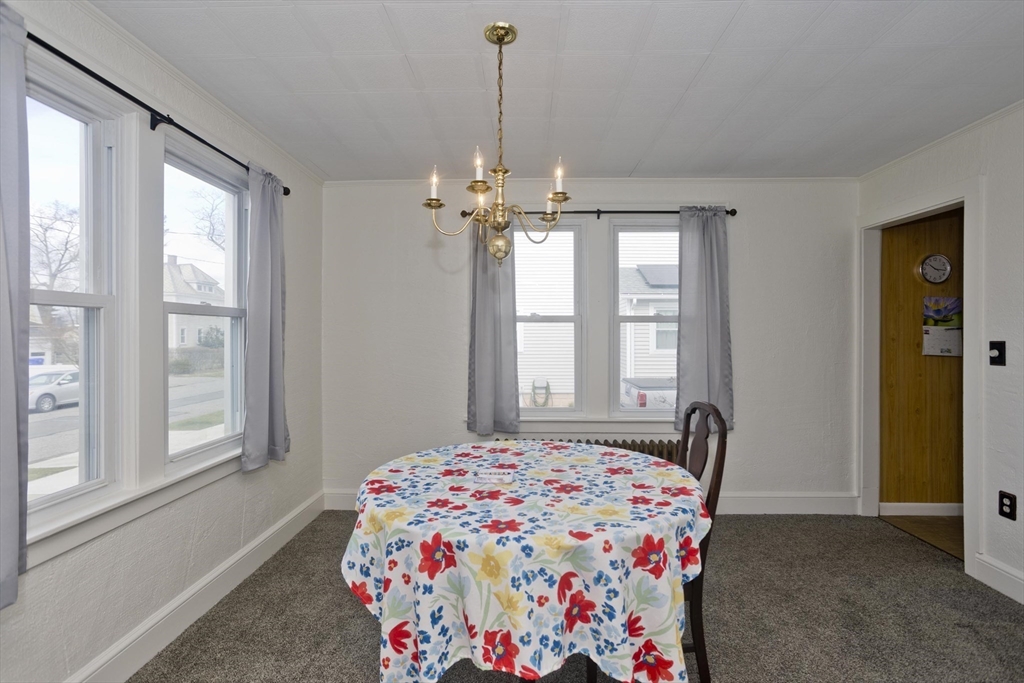 54 Athol Street Springfield, MA 01107 - Photo 10 of 28 a bedroom that has a bed and a window in it