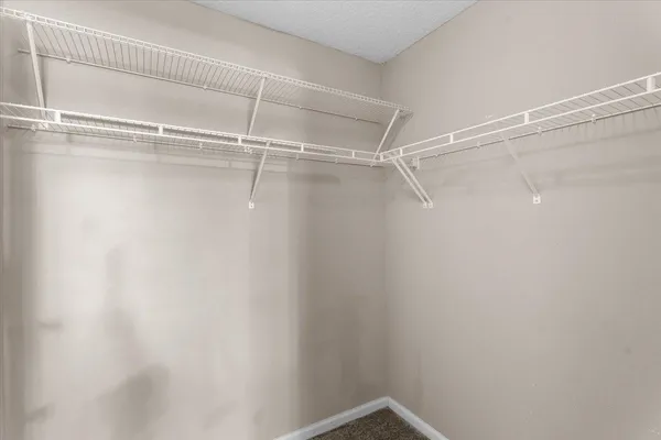a view of an empty walk in closet