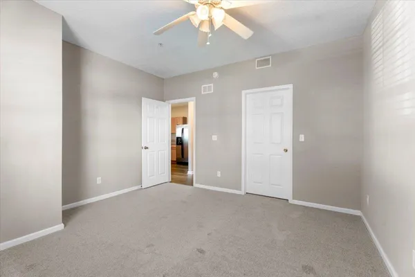 an empty room with a bathroom