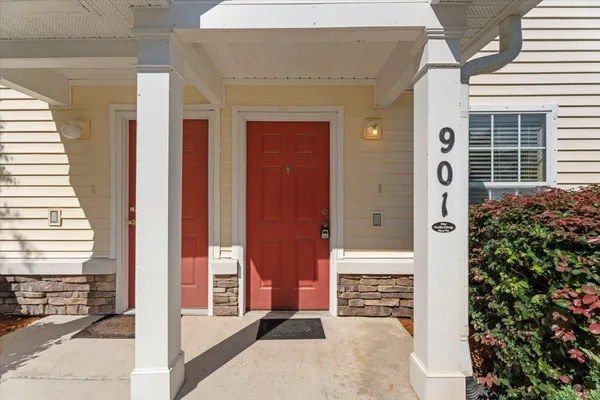 a front view of a house with a garage