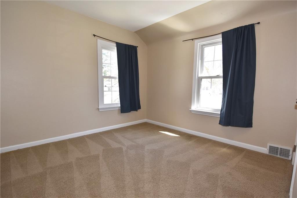 5470 Library Road Bethel Park, PA 15102 - Photo 16 of 24 an empty room with windows