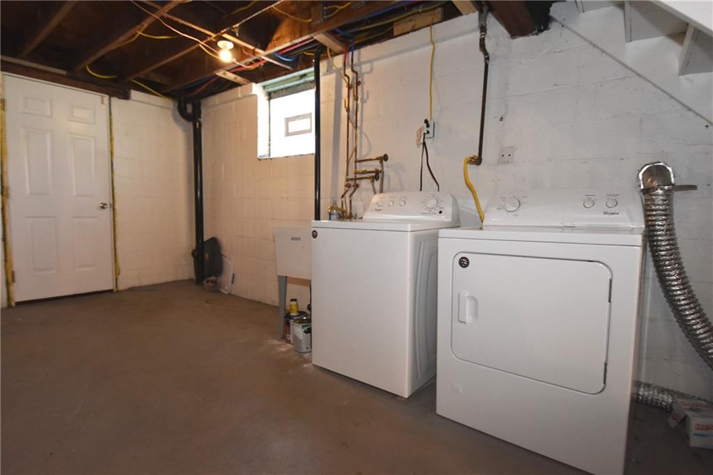 5470 Library Road Bethel Park, PA 15102 - Photo 20 of 24 a view of storage and utility room with washer and dryer