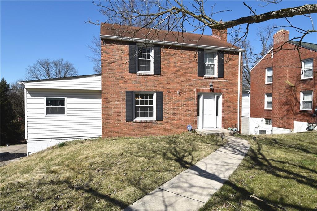 5470 Library Road Bethel Park, PA 15102 - Photo 2 of 24 a view of a house with a yard