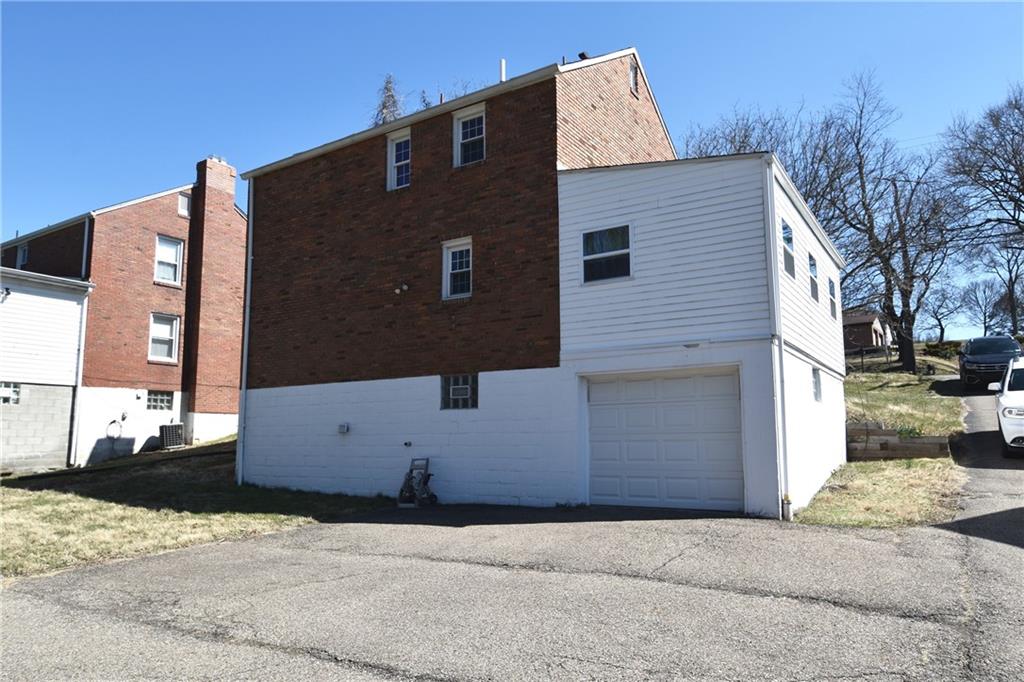 5470 Library Road Bethel Park, PA 15102 - Photo 23 of 24 a front view of a house with a yard