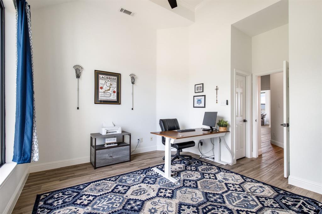 245 Barnes Bridge Road Sunnyvale, TX 75182 - Photo 17 of 40 Your ideal private home office, complete with custom shelved storage and a convenient powder room just steps away.