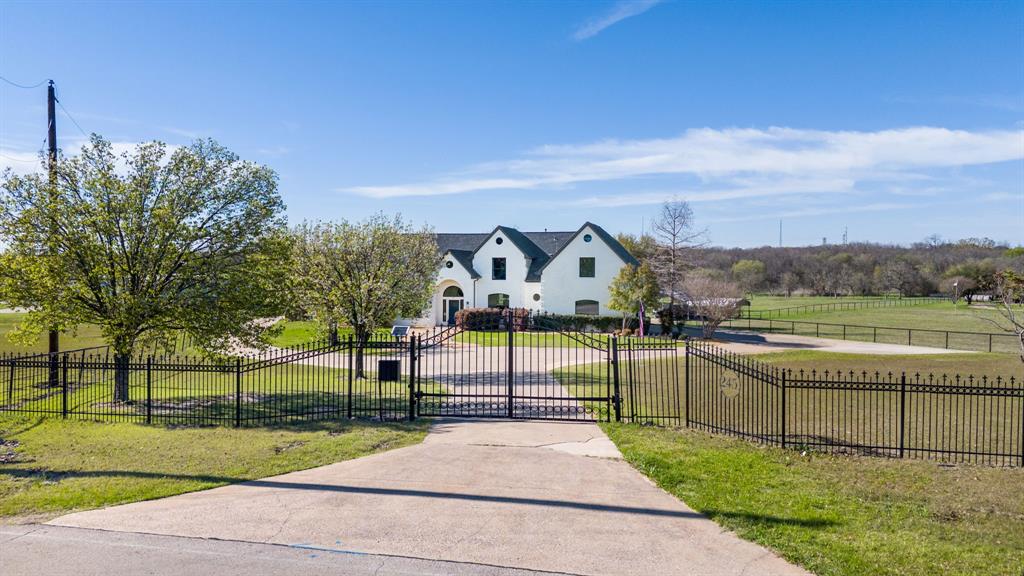 245 Barnes Bridge Road Sunnyvale, TX 75182 - Photo 2 of 40 Beyond these gates lies a lifestyle defined by freedom, privacy, and the beauty of the Sunnyvale landscape.