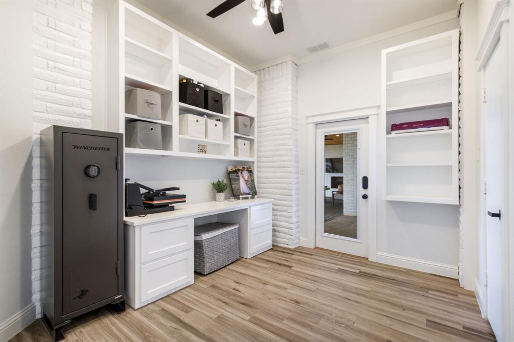 245 Barnes Bridge Road Sunnyvale, TX 75182 - Photo 22 of 40 The glass door opens up to the outdoor patio living area. There's a closet that provides ample space for additional storage.