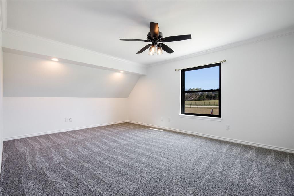 245 Barnes Bridge Road Sunnyvale, TX 75182 - Photo 30 of 40 Upstairs bedroom 4 with a spacious closet. This home has abundant storage spaces.