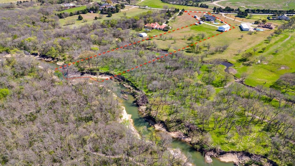 245 Barnes Bridge Road Sunnyvale, TX 75182 - Photo 4 of 40 Property extends to the middle of the second creek (per survey) as outlined on this photo. Survey indicates middle of the creek. Boundaries are estimated and can be confirmed by survey pins.