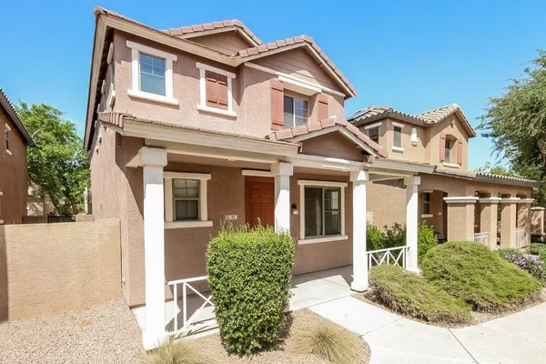front view of a house with a small yard