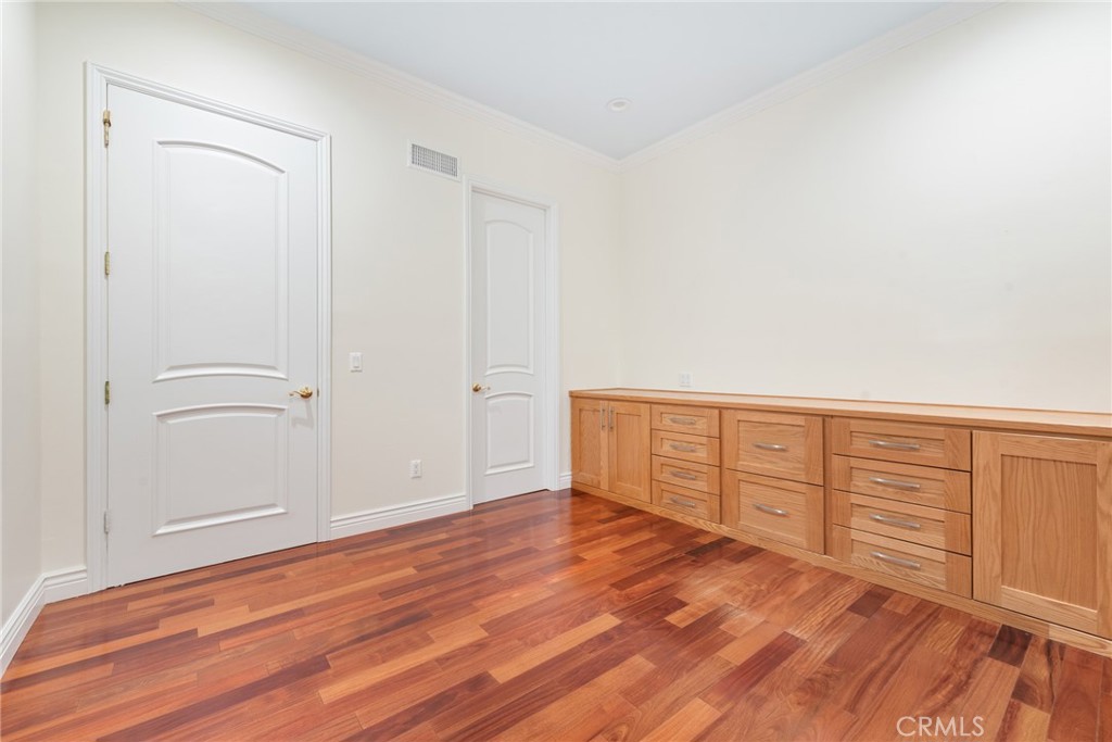 21819 Chestnut Court Walnut, CA 91789 - Photo 18 of 32 an empty room with wooden floor