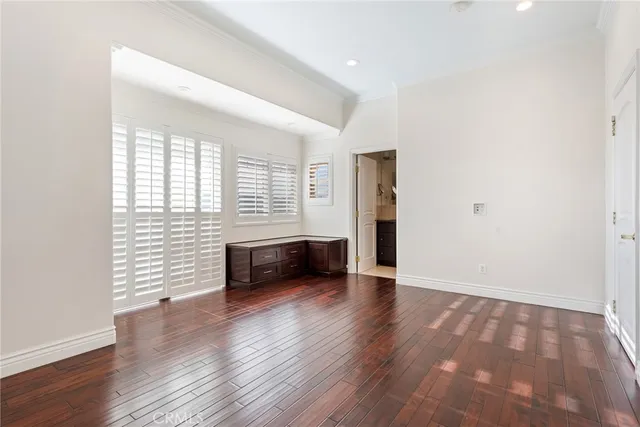 a spacious bathroom with a granite countertop tub sink and mirror