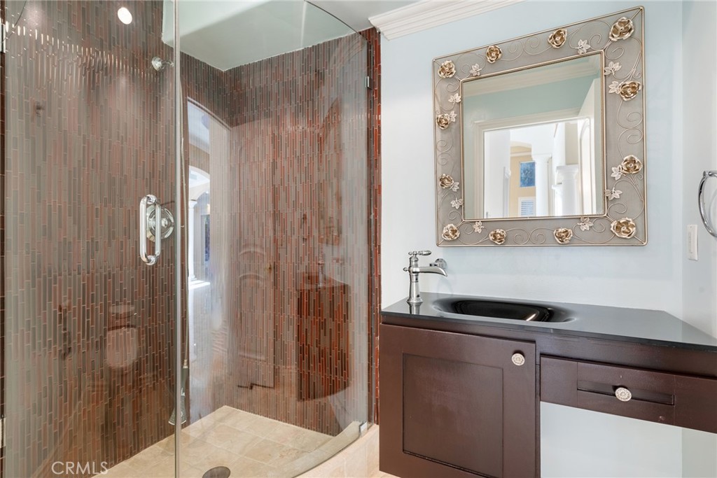 21819 Chestnut Court Walnut, CA 91789 - Photo 10 of 32 a bathroom with a sink and a mirror