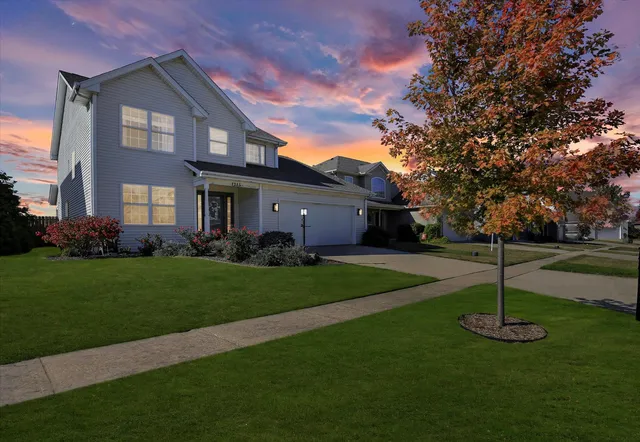 a view of a building with a yard