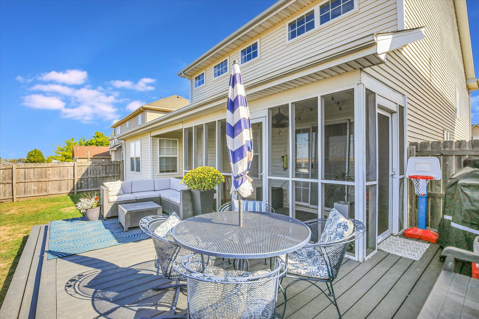 1315 West Ridge Lane Champaign, IL 61822 - Photo 12 of 102 a view of a house with backyard and sitting area