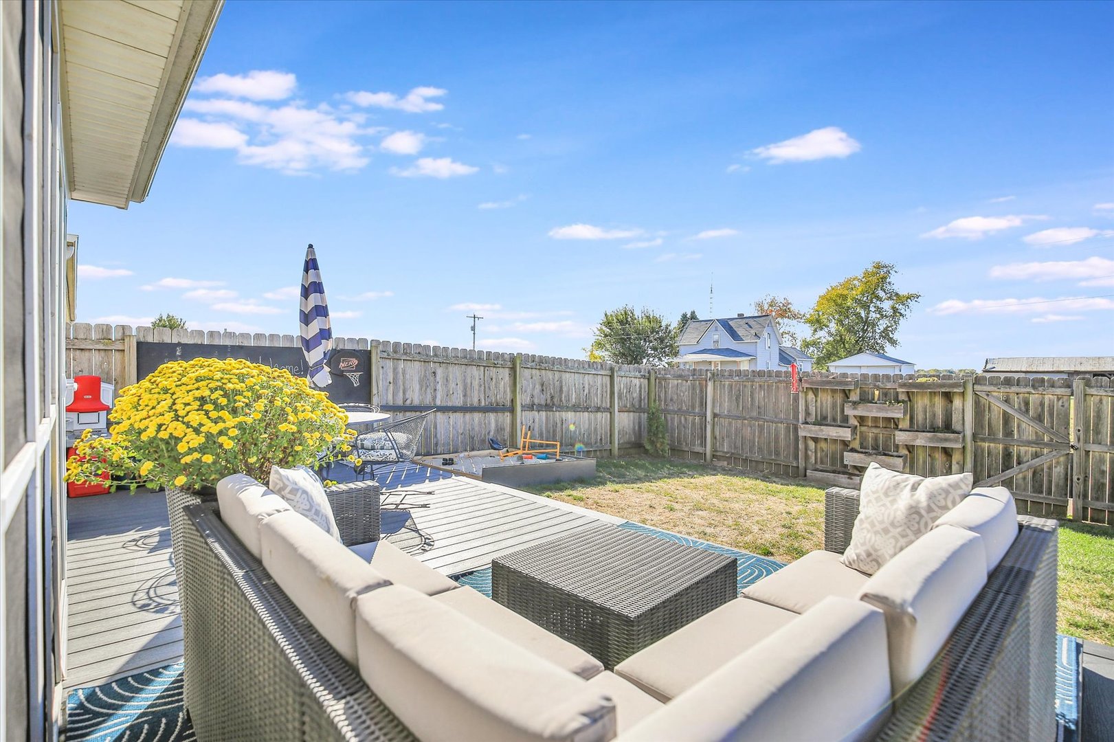 1315 West Ridge Lane Champaign, IL 61822 - Photo 16 of 102 a view of a patio with couches table and chairs
