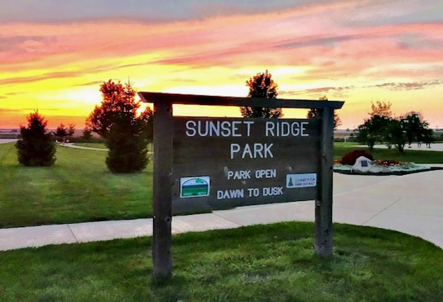 1315 West Ridge Lane Champaign, IL 61822 - Photo 4 of 102 a view of a park with sign board
