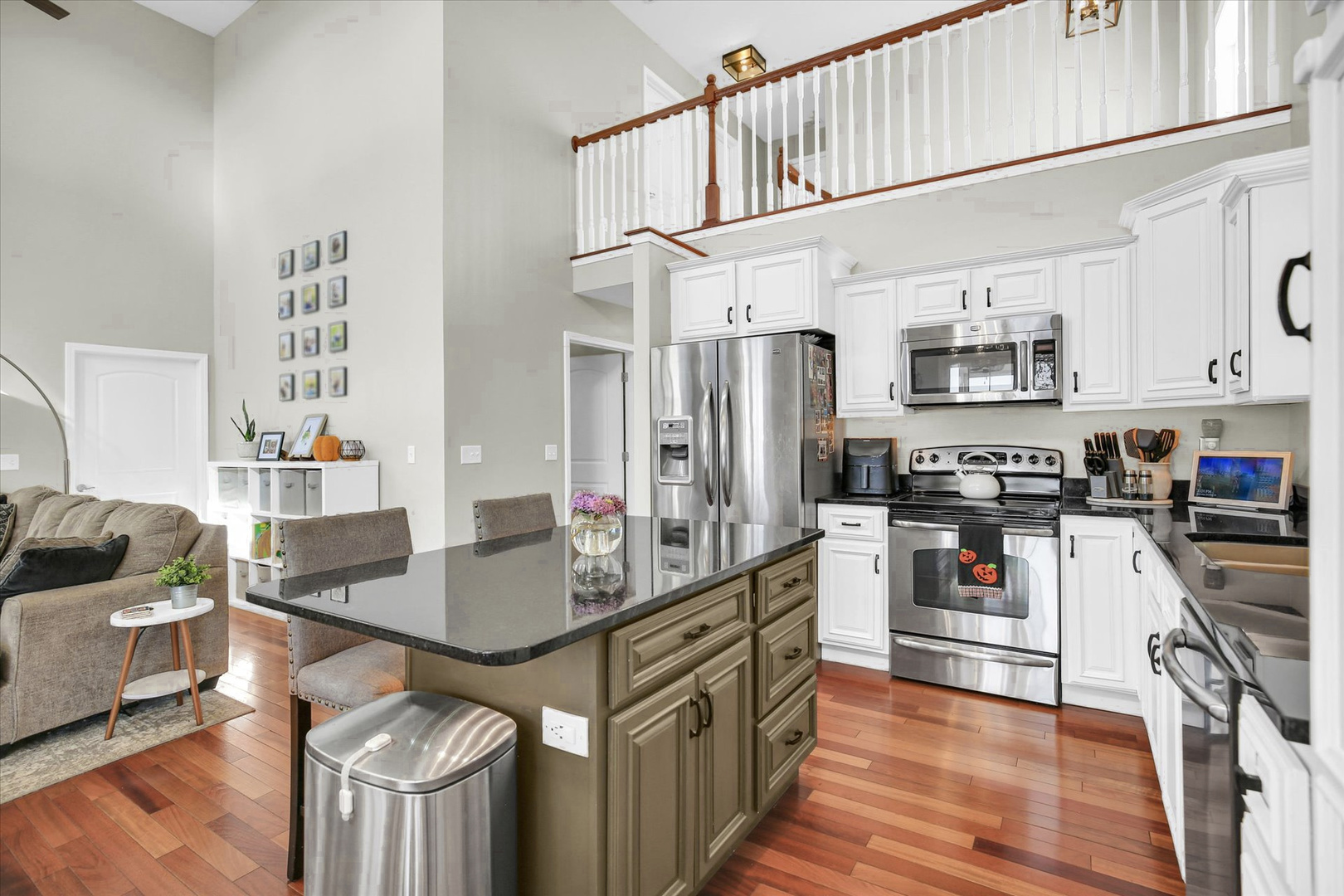 1315 West Ridge Lane Champaign, IL 61822 - Photo 44 of 102 a kitchen with stainless steel appliances granite countertop a sink refrigerator and cabinets