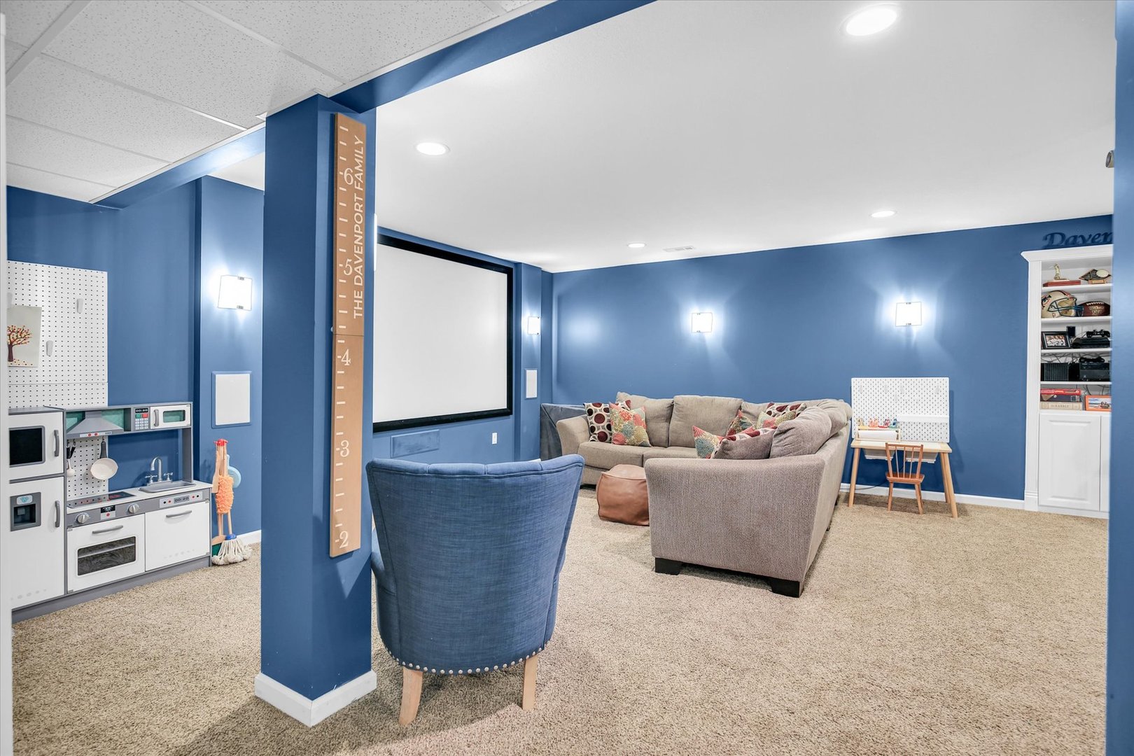 1315 West Ridge Lane Champaign, IL 61822 - Photo 79 of 102 a living room with furniture and a flat screen tv