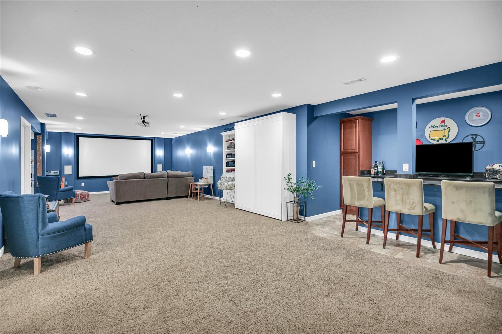 1315 West Ridge Lane Champaign, IL 61822 - Photo 82 of 102 a living room with furniture and a flat screen tv