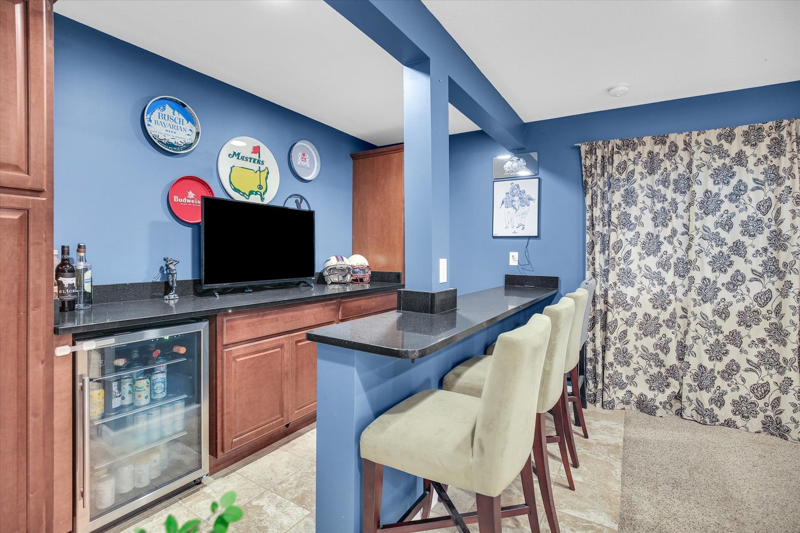 1315 West Ridge Lane Champaign, IL 61822 - Photo 83 of 102 a dining room with furniture and a flat screen tv