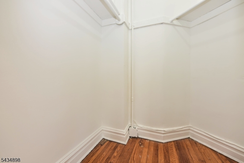 303 Hamilton Place, Unit A4 Hackensack, NJ 07601 - Photo 8 of 13 a view of a room with wooden floor