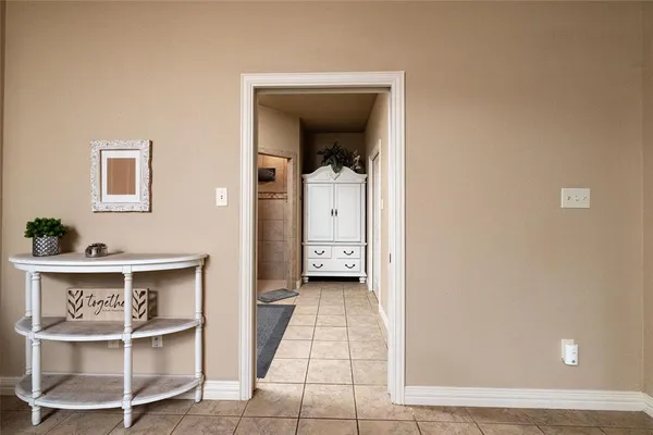 a bathroom with a toilet sink and shower