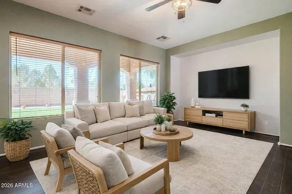 a view of a dining room with furniture window and wooden floor