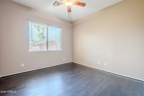 a kitchen with stainless steel appliances granite countertop a refrigerator and cabinets